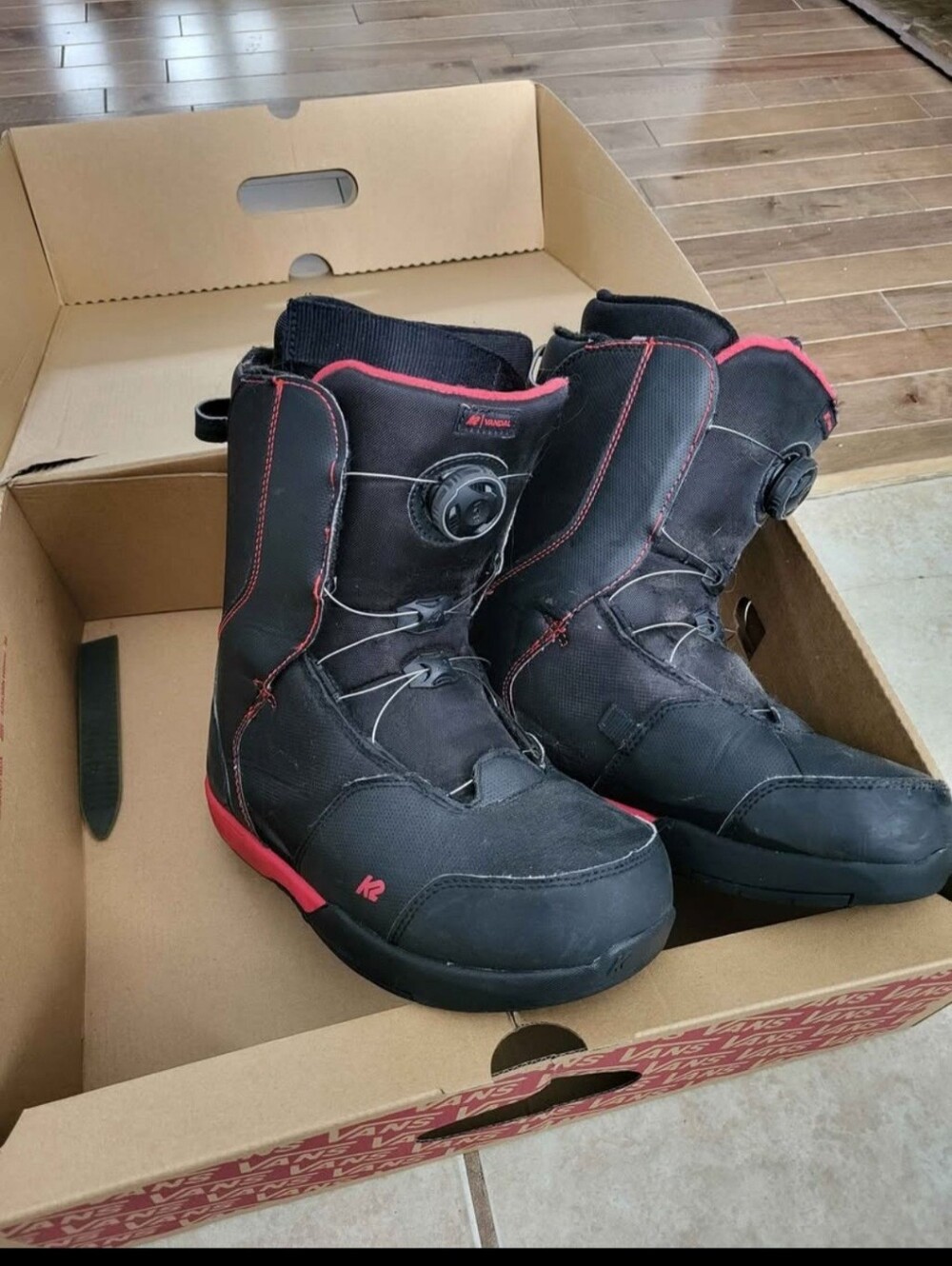 Vandal Black Snowboard Boots with Red Accents